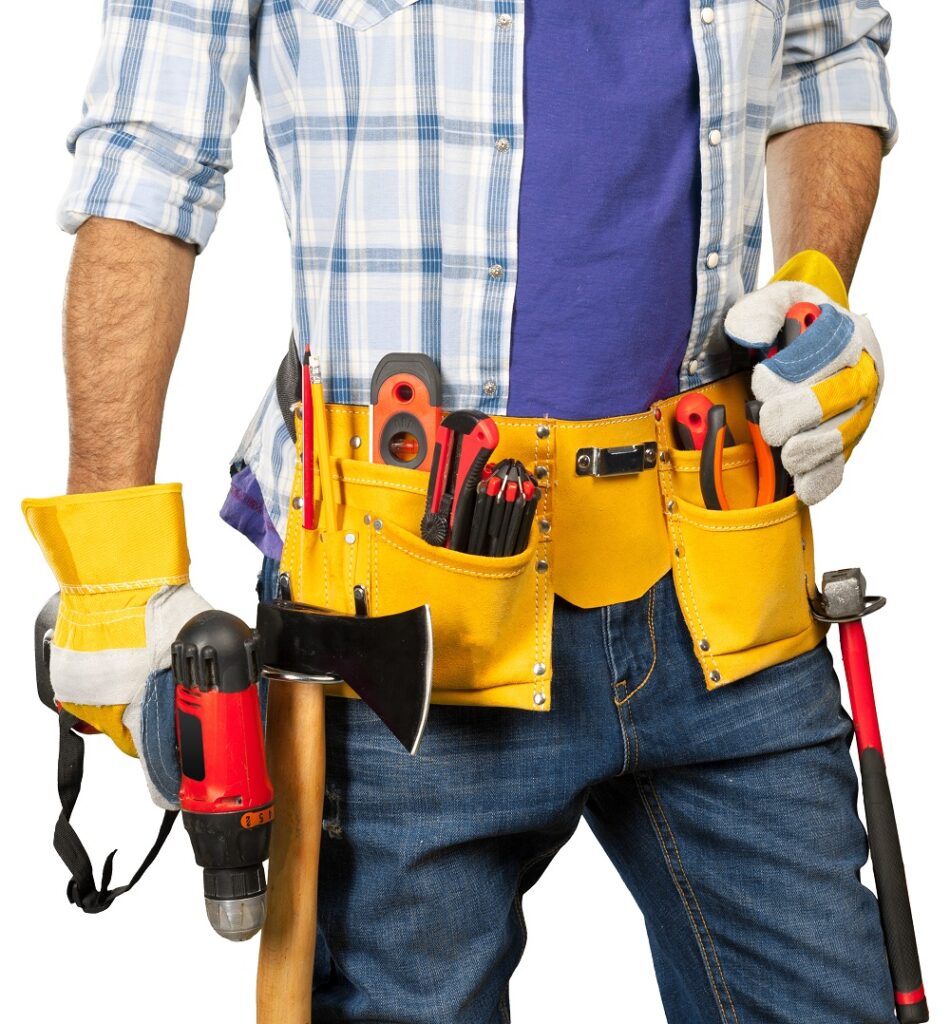 Construction worker carrying tools